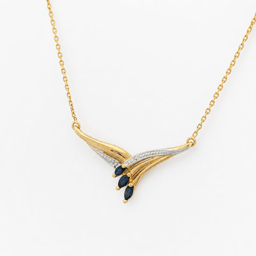 Collier stylisé en or bicolore, saphirs et diamant 58 Facettes 37362