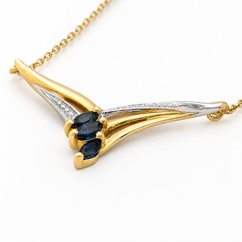 Collier stylisé en or bicolore, saphirs et diamant 58 Facettes 37362