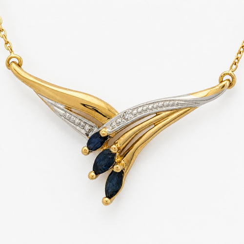 Collier stylisé en or bicolore, saphirs et diamant 58 Facettes 37362