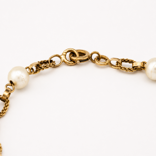 Bracelet chaîne en or jaune et perles de culture 58 Facettes 36974