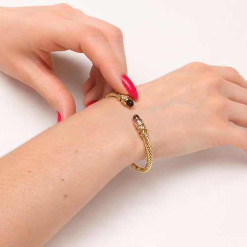 Bracelet jonc torsadé en or jaune, améthystes et diamants 58 Facettes 36969