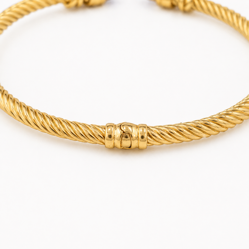 Bracelet jonc torsadé en or jaune, améthystes et diamants 58 Facettes 36969
