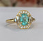 54 Bague en or jaune 18 ct, tourmaline Paraiba et diamants 58 Facettes ring