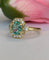 54 Bague en or jaune 18 ct, tourmaline Paraiba et diamants 58 Facettes ring
