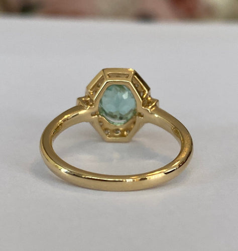 54 Bague en or jaune 18 ct, tourmaline Paraiba et diamants 58 Facettes ring