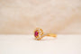 https://cdn.shopify.com/s/files/1/0963/7950/2920/files/bague-marguerite-tourbillon-or-jaune.jpg?v=1788341974