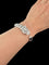 Panther - Bracelet manchette en or blanc, diamants, onyx et émeraudes 58 Facettes BR1575