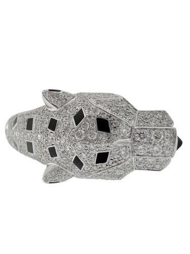 Panther - Bracelet manchette en or blanc, diamants, onyx et émeraudes 58 Facettes BR1575