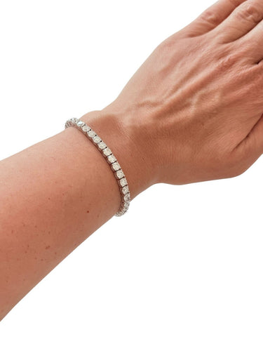 Bracelet Tennis en or blanc et diamants 12,30 ct 58 Facettes BR1559