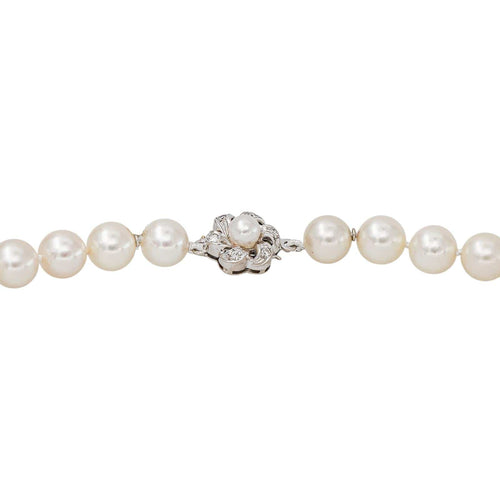 Collier floral en or blanc, perles et diamants 58 Facettes 5488790CN