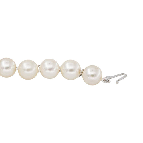 Collier floral en or blanc, perles et diamants 58 Facettes 5488790CN