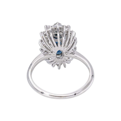 56 Bague marquise en or blanc, saphirs et diamants 58 Facettes 5992873RV