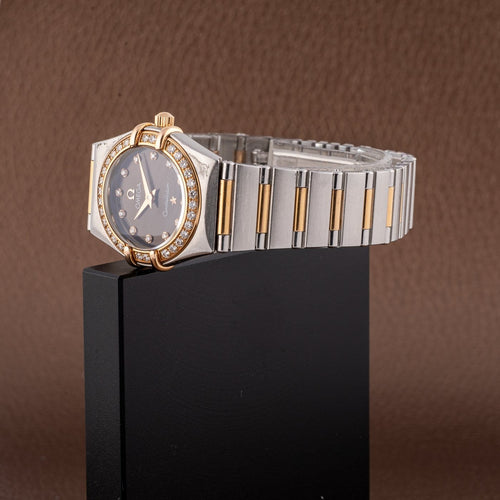 Omega Constellation - Montre femme en or rose et acier 58 Facettes TOT-11807