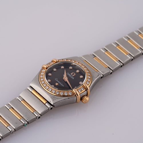 Omega Constellation - Montre femme en or rose et acier 58 Facettes TOT-11807