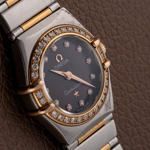 Omega Constellation - Montre femme en or rose et acier 58 Facettes TOT-11807