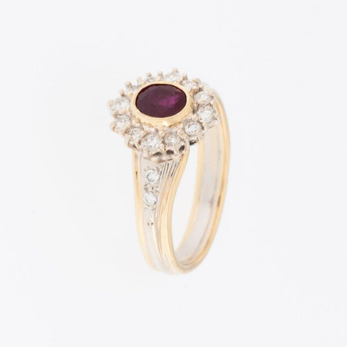 56 Bague milieu XXe en or jaune et blanc 18 carats, diamants et rubis 58 Facettes A1507