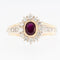 56 Bague milieu XXe en or jaune et blanc 18 carats, diamants et rubis 58 Facettes A1507