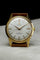 Buren - Montre Super Slender Automatic plaquée or 58 Facettes prod_01KQMRJ49T31H1B4K6WJNASF28