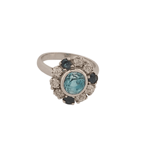 Bague en or blanc, diamants, saphirs et zircon