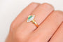 https://cdn.shopify.com/s/files/1/0963/7950/2920/files/bague-ancienne-navette-emeraude.jpg?v=1788355362