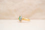https://cdn.shopify.com/s/files/1/0963/7950/2920/files/bague-navette-emeraude-diamants.jpg?v=1788355362