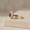 55.5 Bague entourage ancienne en or rose avec rubis et diamants taille ancienne 58 Facettes HJ062642