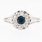 54 Bague rétro en platine avec diamants et saphirs 58 Facettes A1524