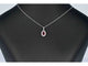 Pendentif halo en or blanc, diamant et rubis 58 Facettes 2017