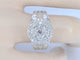 54 Bague halo en or blanc et diamants 58 Facettes 2041