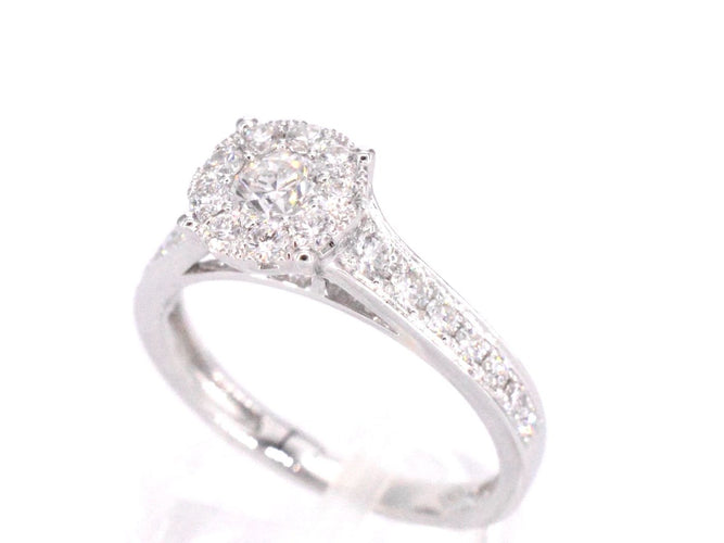 53 Bague halo en or blanc et diamants taille brillant 1,00 ct 58 Facettes 1001