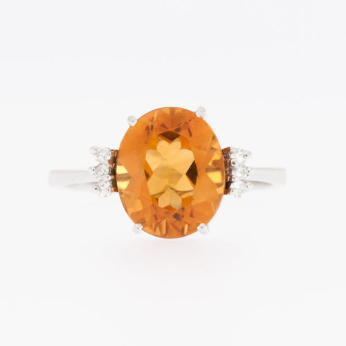 57 Bague suisse en or blanc avec topaze dorée et diamants 58 Facettes A1571