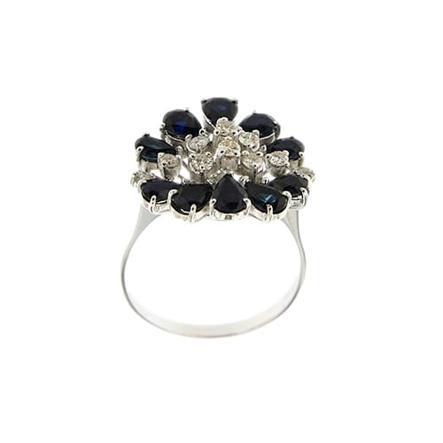 64 Bague fleur en or blanc avec saphirs et diamants 58 Facettes 30306