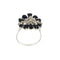 64 Bague fleur en or blanc avec saphirs et diamants 58 Facettes 30306