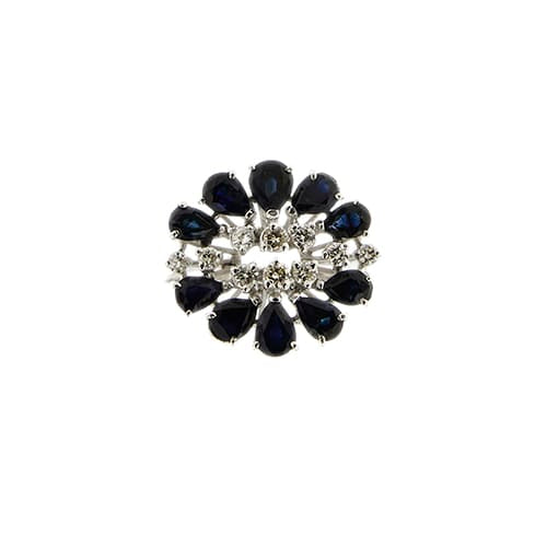64 Bague fleur en or blanc avec saphirs et diamants 58 Facettes 30306