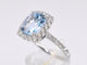 53 Bague halo en or blanc avec topaze naturelle et diamants 58 Facettes 1005