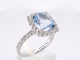 53 Bague halo en or blanc avec topaze naturelle et diamants 58 Facettes 1005