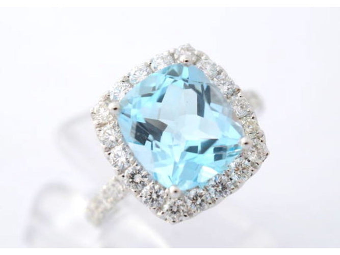 53 Bague halo en or blanc avec topaze naturelle et diamants 58 Facettes 1005