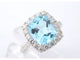53 Bague halo en or blanc avec topaze naturelle et diamants 58 Facettes 1005