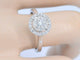 53 Bague halo en or blanc sertie de diamants 58 Facettes 1008