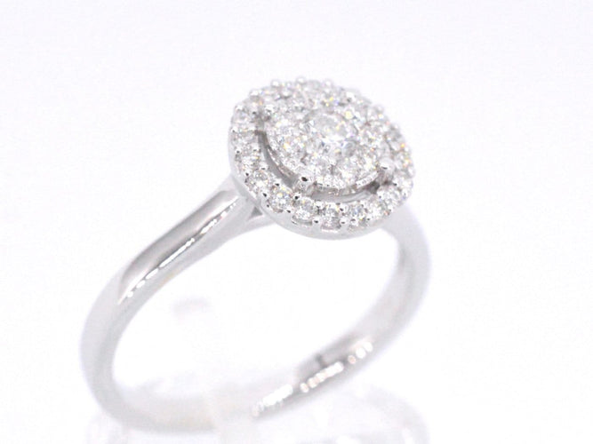 53 Bague halo en or blanc sertie de diamants 58 Facettes 1008