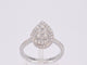 53 Bague halo en or blanc avec diamant poire 58 Facettes 1010
