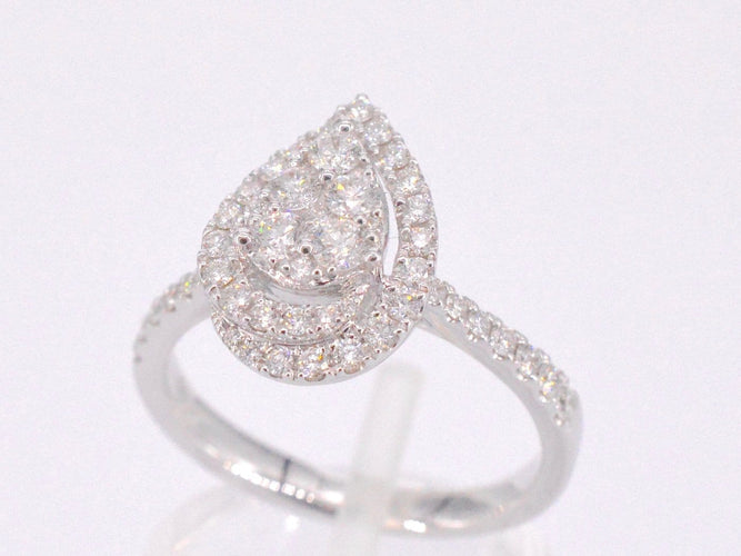 53 Bague halo en or blanc avec diamant poire 58 Facettes 1010