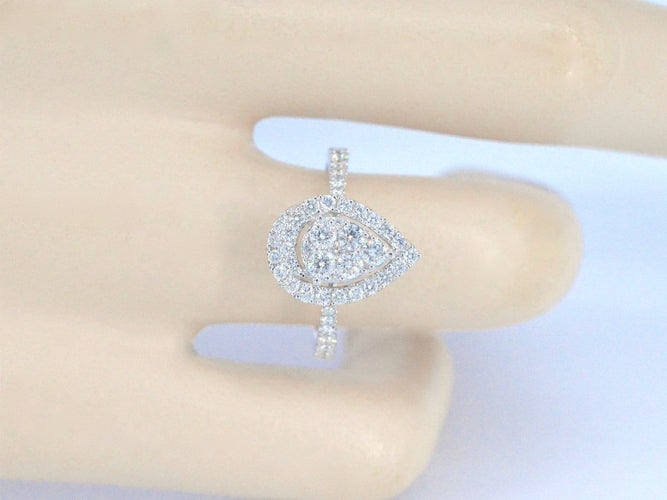 53 Bague halo en or blanc avec diamant poire 58 Facettes 1010