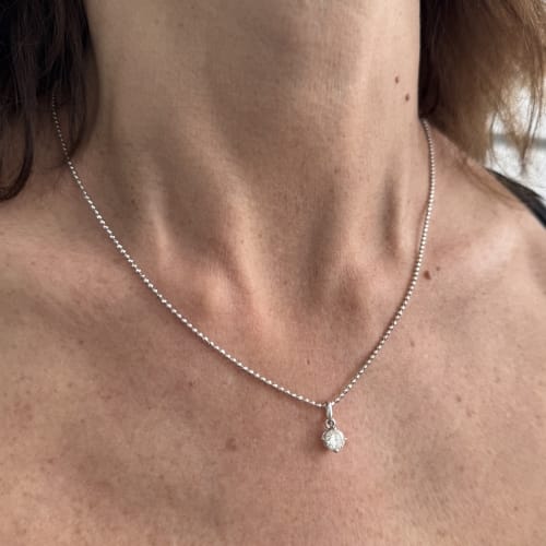 Collier Collier point de lumière en or blanc 18 ct avec diamant 0,59 ct 58 Facettes 15502
