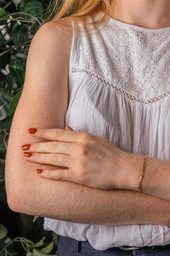 Bracelet maille torsadée en or jaune et or blanc 58 Facettes 5773942CN