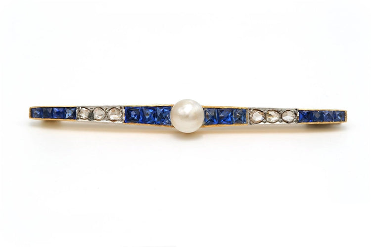 Broche Art déco en or jaune 18 carats, saphirs, perle et diamants 58 Facettes 23044