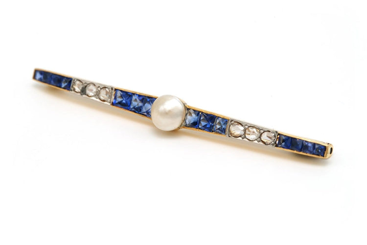 Broche Art déco en or jaune 18 carats, saphirs, perle et diamants 58 Facettes 23044