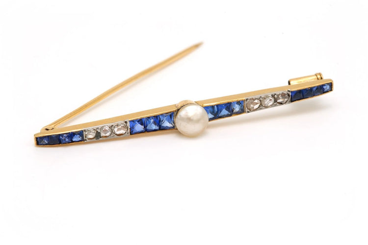 Broche Art déco en or jaune 18 carats, saphirs, perle et diamants 58 Facettes 23044