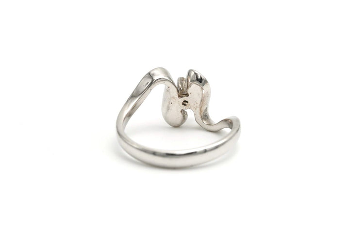 50 Années 70 - Bague en or blanc et diamant 58 Facettes B711