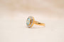 https://cdn.shopify.com/s/files/1/0963/7950/2920/files/bague-doublet-grenat-verre-seconde-main.jpg?v=1788508531